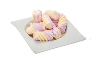 Marshmallow in a bowl on white background photo