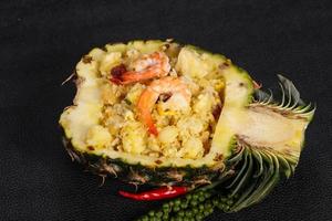 Fried rice with pineapple and prawns photo