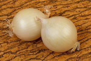 White onion on the wooden photo