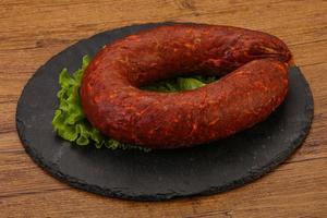 Krakowska sausage over the board photo