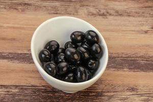 Black olives in the bowl photo