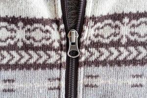 closeup of zipper on fabric texture photo