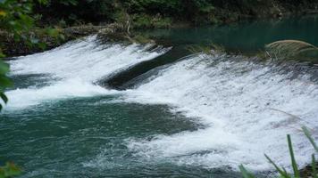 The beautiful village view with the river waterfall in the south of the China photo