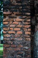 The texture of a red brick wall of an old king's palace photo