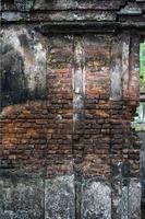 The texture of a red brick wall of an old king's palace photo