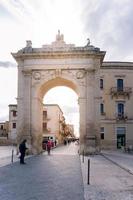 Noto,Italy-May 7, 2022 view of the Royal door to the entrance of the country during a sunny day photo