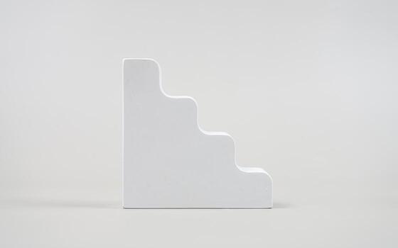 White plaster in various shapes separate from the background photo