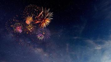 Fireworks with blur milky way background photo