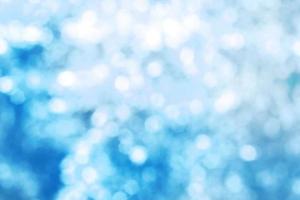 Abstract blurred blue Winter bokeh background. photo