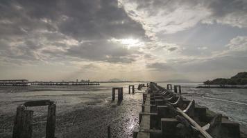 Timelapse of Broken Bridge jetty sunrise with amazing ray and cloud video