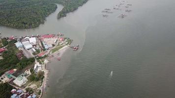 Aerial top down view boat moving toward fish farm at Tanjung Dawai, Kedah. video