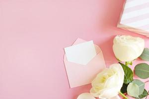 Flowers composition. Rose flower petals on pastel pink background. Valentines day, mothers day, womens day concept. Flat lay, top view, copy space photo