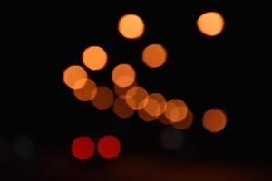Bokeh street light at night time in urban city of thailand. photo