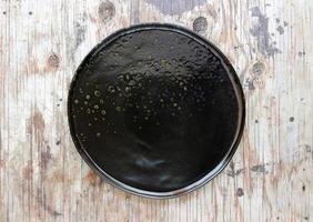 Empty plate in the wood photo