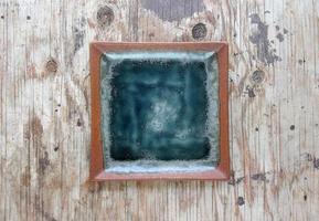 Empty plate in the wood photo