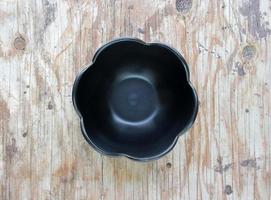 Empty bowl in the wood photo