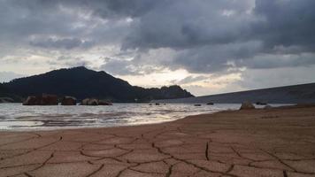 Time lapse crack muddy land and water in the lake video