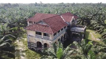 Aerial orbiting haunted mansion 99 doors after abandoned at Penang, Malaysia. video
