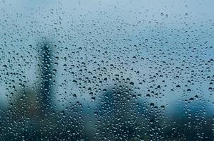 Rain drop on glass window in monsoon season. photo