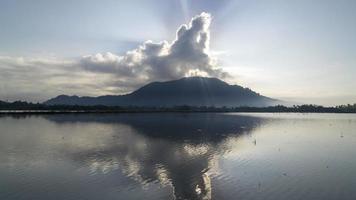 Sunray over reflection paddy field during watering season. video