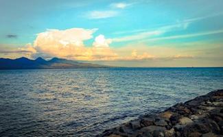 beautiful view on the beach when the weather is sunny in the afternoon photo