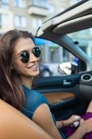 portrait of a girl in a car photo