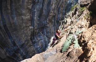 female rock climber photo