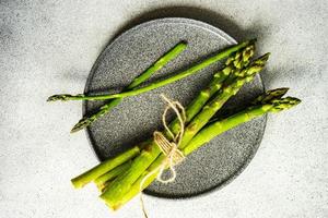 Fresh asparagus plant ready for cooking photo