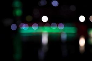 Abstract bokeh light effects on the night. Black background with colorful light effects. background with  Blur bokeh effects. Abstract background texture photo