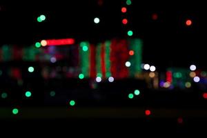 Abstract bokeh light effects on the night. Black background with colorful light effects. background with  Blur bokeh effects. Abstract background texture photo