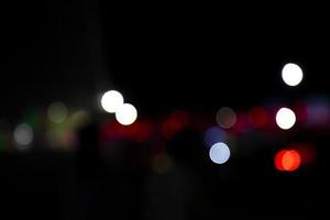 Abstract bokeh light effects on the night. Black background with colorful light effects. background with  Blur bokeh effects. Abstract background texture photo