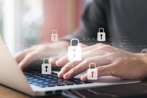 Cybersecurity internet and networking concept. Close up of hand holding smartphone information security and encryption, secure access to user's personal information, secure Internet access. photo