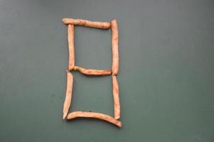 Letters of the english alphabet laid out from french fries photo