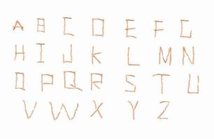 Letters of the english alphabet laid out from french fries photo