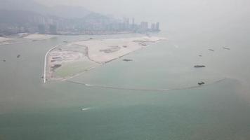 Aerial artificial island build with reclamation land at Gurney Drive. video