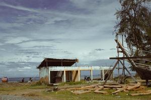 Old building on the edge of the sea photo