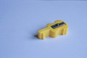 Yellow guitar -shaped pencil sharpener photo