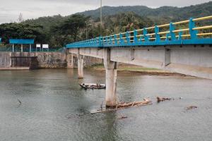 Bridge by boat underneath photo