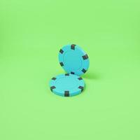 Two poker chips on bright green background photo