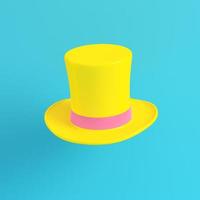 sombreros de copa amarillos sobre fondo azul brillante en color pastel foto