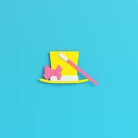 Top hat and magic wand on bright blue background in pastel colors. Minimalism concept photo