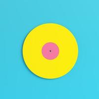 Yellow vinyl record on bright blue background in pastel colors. Minimalism concept photo