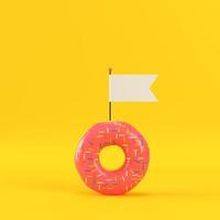 Donut with blank flag on yellow background photo