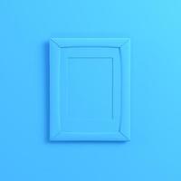 Blank frrame on bright blue background photo