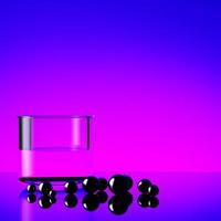 vaso con agua y esferas oscuras foto