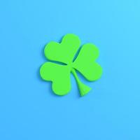 Clover on bright blue background photo