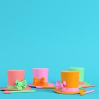 Top hats and magic wand on bright blue background in pastel colors. Minimalism concept photo