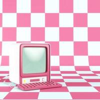 Retro-styled computer on checked background photo