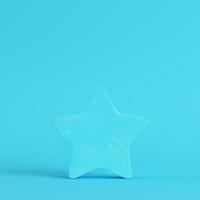 Abstract star on bright blue background in pastel colors photo