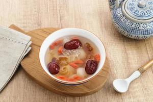 Peach Gum, Chinese traditional drink that contains peach gum, bird nest, red dates, snow fungus, goji berry, and rock sugar. photo